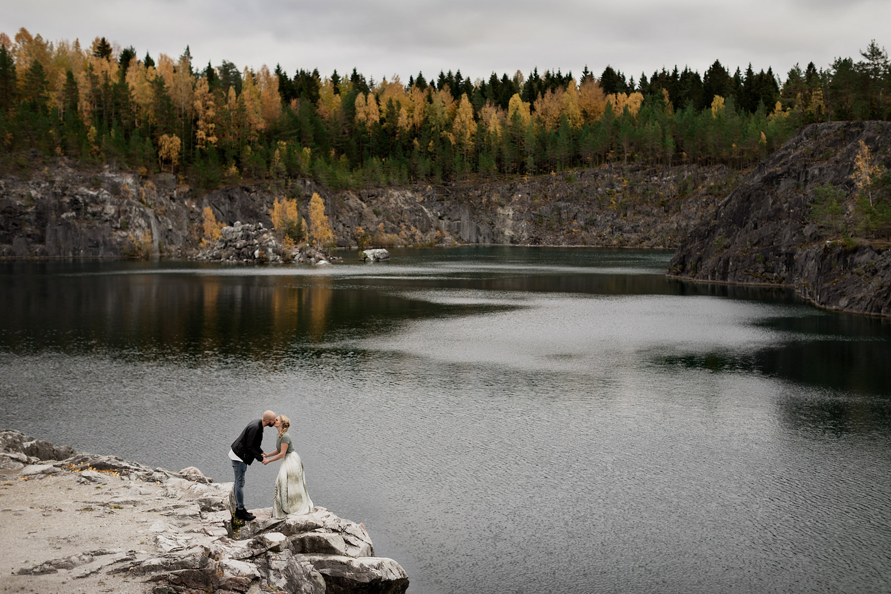 epic love couple having their portrait taken at quarry in the fa
