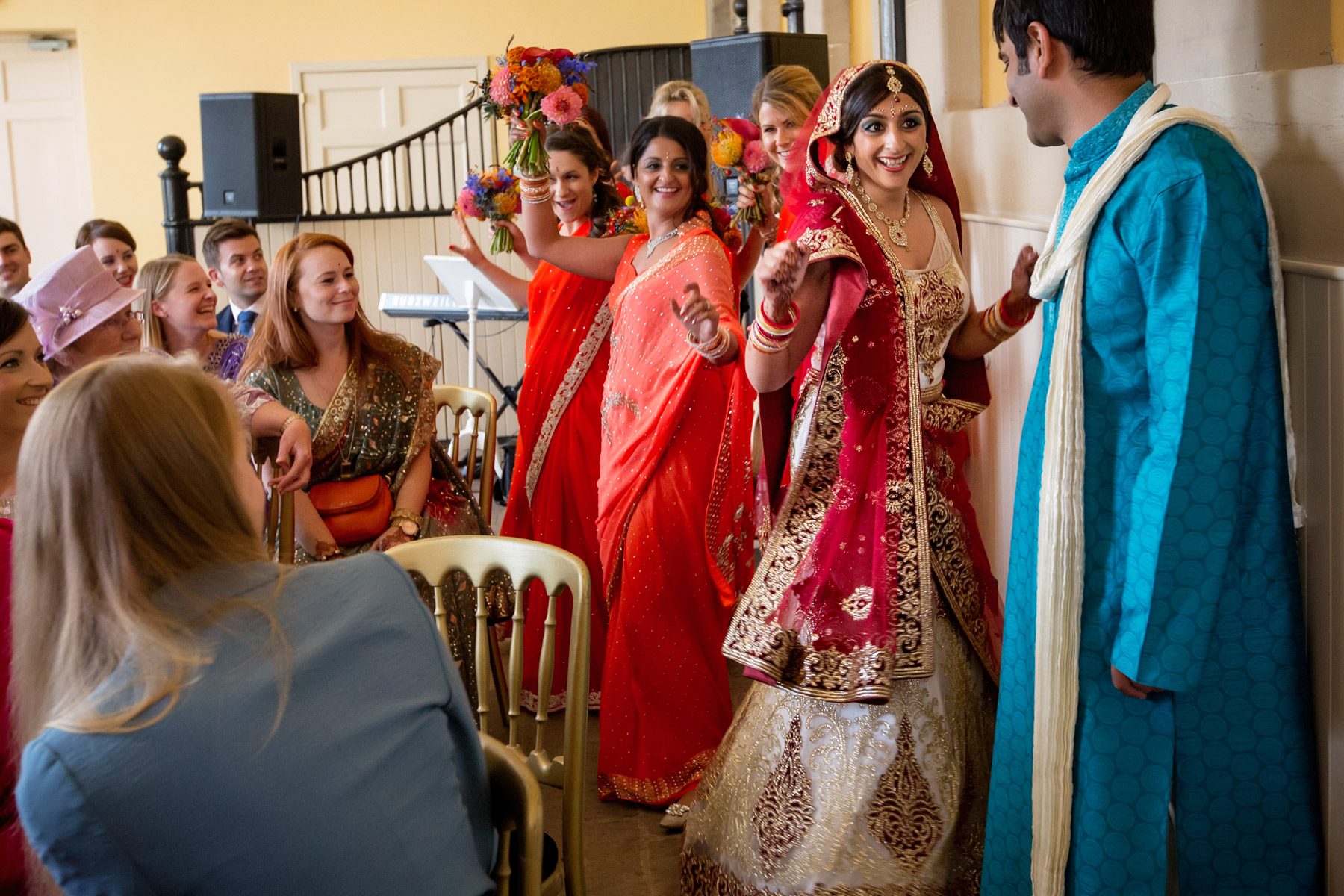bride arrives at Bollywood wedding in scotland